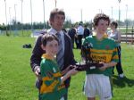 Conor Small & Ruairi McCann receiving their joint award from Leo Heatley