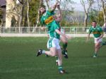 Paul Russell puts in a challenge for the ball