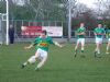 Benny Maguire clears down field