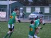 Tommy McCann tangles with Dermot McPeake