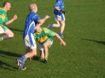 Tony Close tries to stop the attack