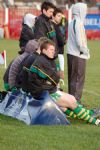 The bench men try to keep warm