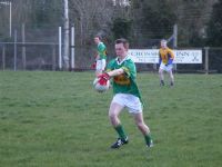Aidan Maguire starts an attack