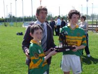 Conor Small & Ruairi McCann receiving their joint award from Leo Heatley